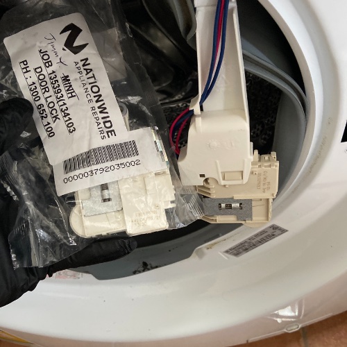 NWAR Technicians replacing Washing Machine door lock spare parts, 12 months parts warranty